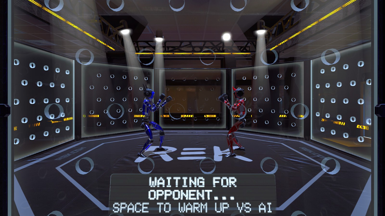 The REK simulator championship arena, two robots squaring up under the lights